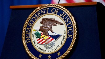 The seal of the U.S. Justice Department. File photo/ Reuters