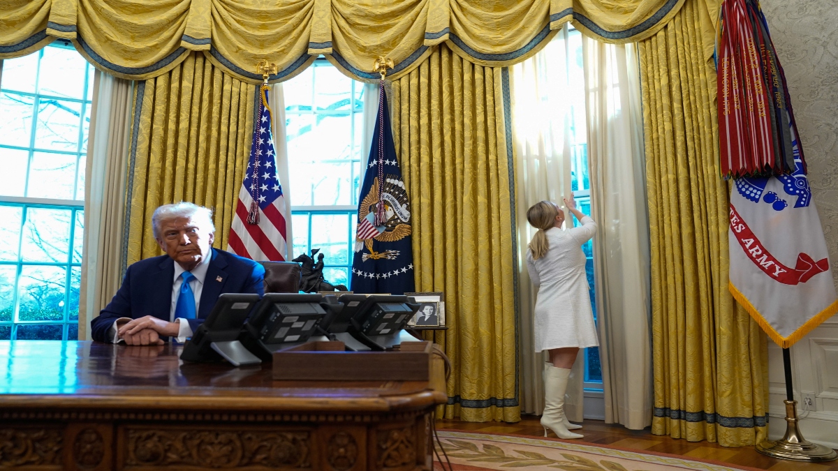 White House press secretary Karoline Leavitt closes a curtain before US President Donald Trump signs documents in the Oval Office at the White House in Washington, US, on February 4, 2025. Reuters File White House press secretary Karoline Leavitt closes a curtain before US President Donald Trump signs documents in the Oval Office at the White House in Washington, US, on February 4, 2025. Reuters File
