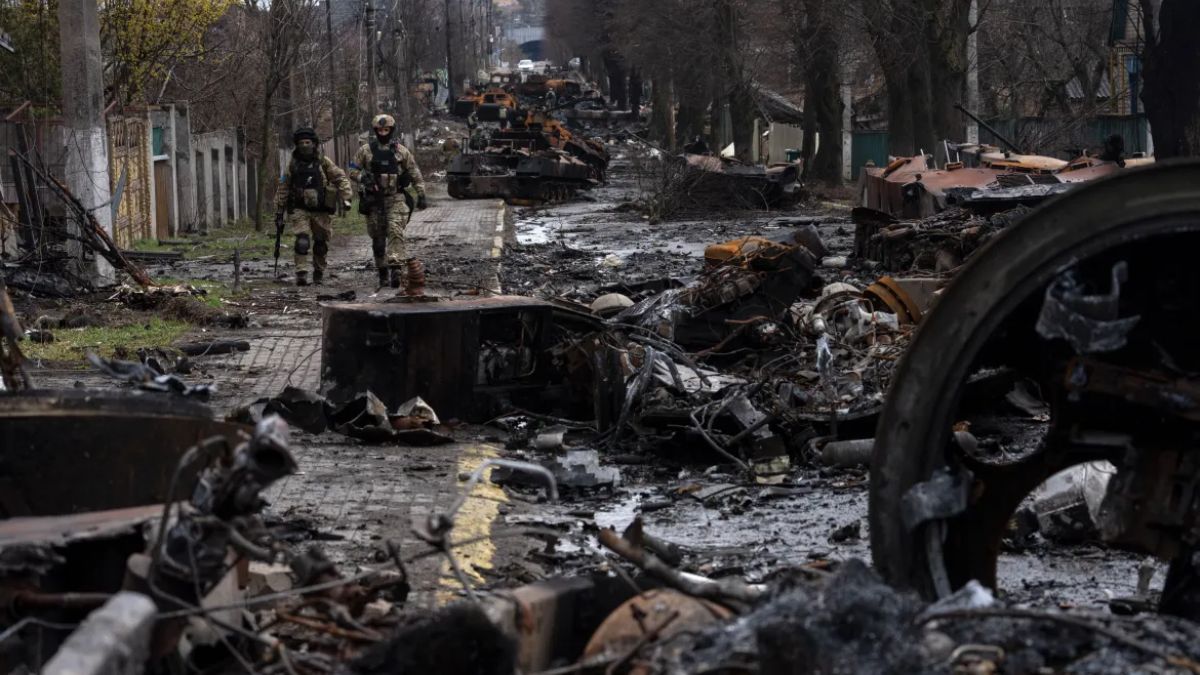 Soldiers walk amid destroyed Russian tanks in Bucha, in the outskirts of Kyiv, Ukraine. File image/AP Soldiers walk amid destroyed Russian tanks in Bucha, in the outskirts of Kyiv, Ukraine. File image/AP