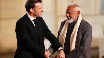 PM Narendra Modi, right, is greeted by President of France Emmanuel Macron as he arrives for a reception at Palais de l'Elysee in Paris on February 10, 2025. AP