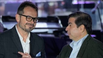 FILE - Colombia's Interior Minister Juan Fernando Cristo, right, speaks with Special Representative and Head of the U.N. Verification Mission in Colombia Carlos Massieu, before an event marking the 8th anniversary of the peace agreement signing with the FARC in Bogota, Colombia, Nov. 21, 2024. AP