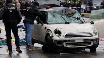 Police work at a car which drove into a crowd in Munich, Germany, February 13, 2025, injuring several people. Reuters