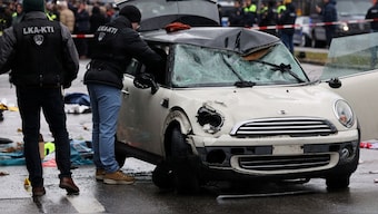 Police work at a car which drove into a crowd in Munich, Germany, February 13, 2025, injuring several people. Reuters