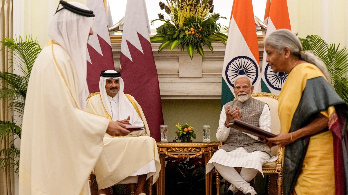 Prime Minister Narendra Modi and Amir of Qatar Sheikh Tamim Bin Hamad Al Thani witness Union Finance Minister Nirmala Sitharaman and Prime Minister and Minister of Foreign Affairs of Qatar Sheikh Mohammed bin Abdulrahman bin Jassim Al Thani exchanging MoU documents, at the Hyderabad House in New Delhi. PTI Prime Minister Narendra Modi and Amir of Qatar Sheikh Tamim Bin Hamad Al Thani witness Union Finance Minister Nirmala Sitharaman and Prime Minister and Minister of Foreign Affairs of Qatar Sheikh Mohammed bin Abdulrahman bin Jassim Al Thani exchanging MoU documents, at the Hyderabad House in New Delhi. PTI