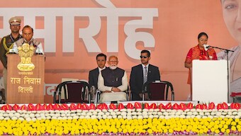PM Narendra Modi looks on as BJP leader Rekha Gupta is sworn-in as Delhi Chief Minister by Lt. Governor V K Saxena during the oath ceremony, in New Delhi, February 20, 2025. PTI