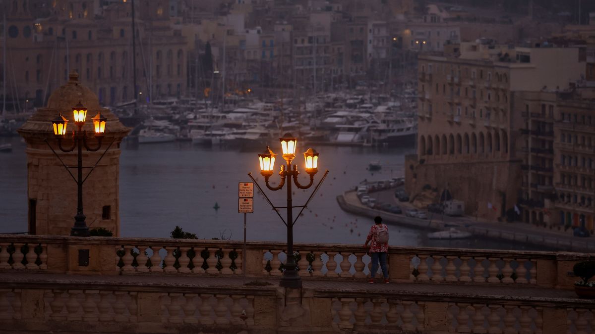 A man looks out over the Grand Harbour at dawn in Valletta, Malta, May 15, 2024. File Photo/Reuters A man looks out over the Grand Harbour at dawn in Valletta, Malta, May 15, 2024. File Photo/Reuters