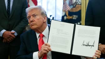 Trump stated that the sale of these cards would begin in around two weeks. AP/File Photo
