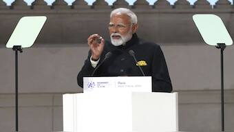 Prime Minister Narendra Modi addresses the audience at the Grand Palais during the Artificial Intelligence Action Summit in Paris. In his address, he called for collective global efforts to establish governance and standards for artificial intelligence. AP
