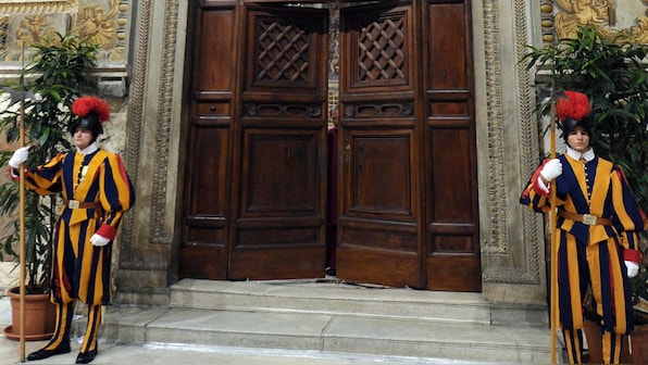 Who after Pope Francis? Exit tourists, enter cardinals as the Vatican closes Sistine Chapel for papal conclave