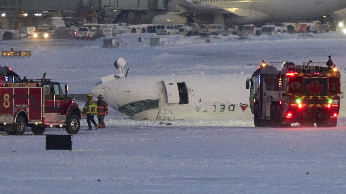 A Delta airlines plane sits on its roof after crashing upon landing at Toronto Pearson Airport in Toronto, Ontario. A Delta Air Lines jet with 80 people onboard crash landed Monday at the Toronto airport, officials said, flipping upside down and leaving at least 15 people injured but causing no fatalities. AFP A Delta airlines plane sits on its roof after crashing upon landing at Toronto Pearson Airport in Toronto, Ontario. A Delta Air Lines jet with 80 people onboard crash landed Monday at the Toronto airport, officials said, flipping upside down and leaving at least 15 people injured but causing no fatalities. AFP