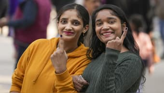 First time voters show their inked fingers after casting votes during the Delhi Assembly elections, at Chhattarpur in New Delhi. The voter turnout until 11.30 pm on February 5 was 60.42 per cent. PTI