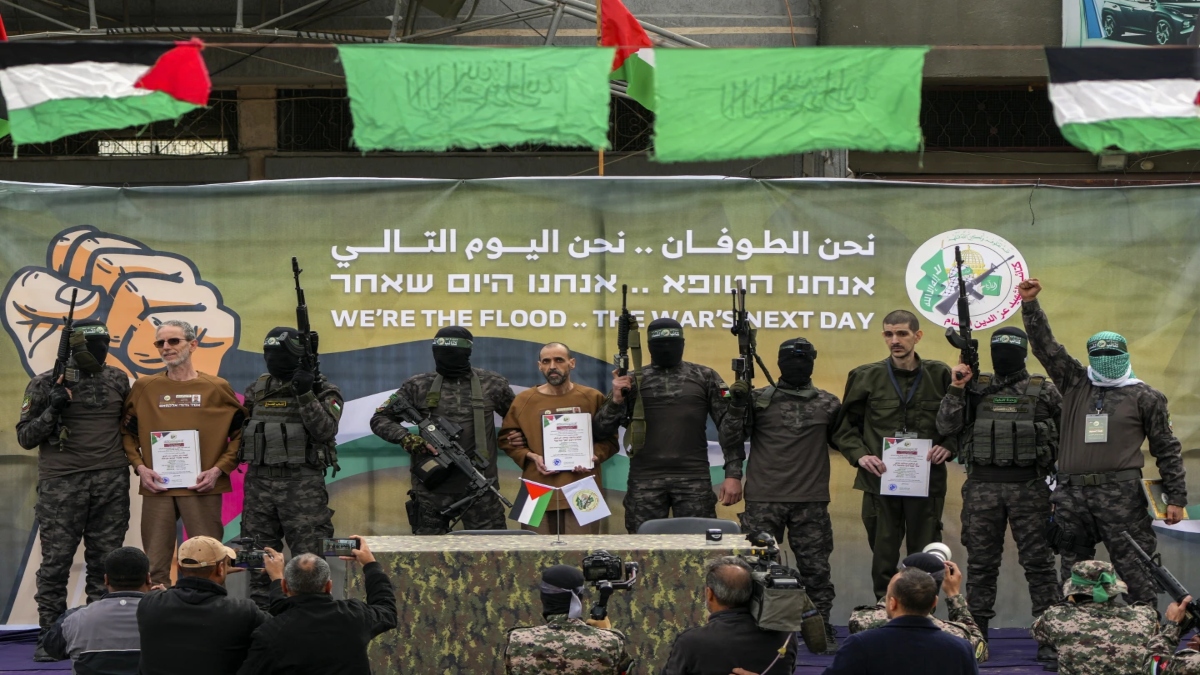 The photograph shows three Israeli male hostages being released by Hamas in the fifth exchange under the ceasefire deal. (Photo: AP) The photograph shows three Israeli male hostages being released by Hamas in the fifth exchange under the ceasefire deal. (Photo: AP)