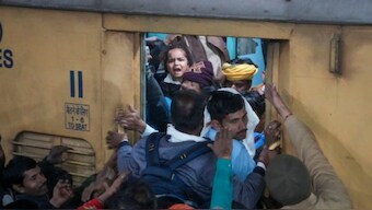 Heavy rush of passengers to catch a train for Prayagraj's Mahakumbh, at the New Delhi railway station, Saturday, Feb. 15, 2025. (Source: PTI)