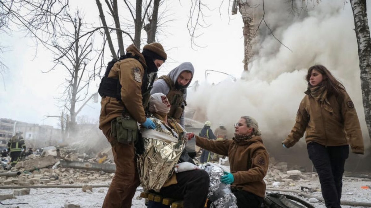 Medical workers treat a wounded resident at the site of residential buildings heavily damaged during a Russian missile attack in Kharkiv in January 2024. Source: Reuters Medical workers treat a wounded resident at the site of residential buildings heavily damaged during a Russian missile attack in Kharkiv in January 2024. Source: Reuters