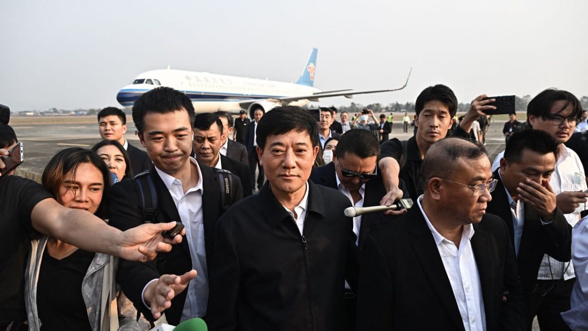 Chinese Public Security Assistant Minister Liu Zhongyi (C) is surrounded by media after inspecting the repatriation of alleged scam centre workers and victims from China, at Mae Sot International Airport in Tak province on February 20, 2025. Hundreds of Chinese workers were heading home on February 20, 2025 after being freed from online scam centres in Myanmar, as authorities crack down on the illegal operations. Chinese Public Security Assistant Minister Liu Zhongyi (C) is surrounded by media after inspecting the repatriation of alleged scam centre workers and victims from China, at Mae Sot International Airport in Tak province on February 20, 2025. Hundreds of Chinese workers were heading home on February 20, 2025 after being freed from online scam centres in Myanmar, as authorities crack down on the illegal operations.