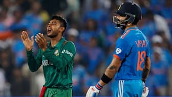 Virat Kohli and Mehidy Hasan during the 2023 ODI World Cup. Image: Reuters