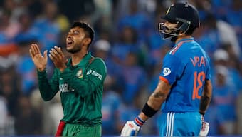 Virat Kohli and Mehidy Hasan during the 2023 ODI World Cup. Image: Reuters