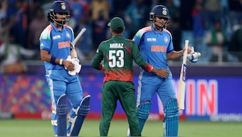 Shubman Gill and KL Rahul shake hands with Bangladesh's Mehidy Hasan Miraz. Image: Reuters