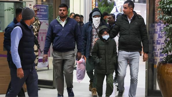 Deportation row in Parliament: ‘No women or children were restrained,’ govt cites US response