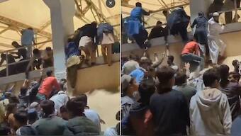 Fans in Pakistan can be seen breaching the security at Karachi Stadium. Image: x.com