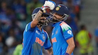 Virat Kohli congratulates Shreyas Iyer after he scored fifty against Pakistan. Image: AP