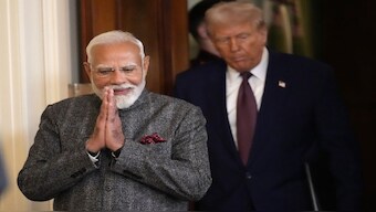 Prime Minister Narendra Modi and US President Donald Trump arrive for a news conference in the East Room of the White House on February 13. AP