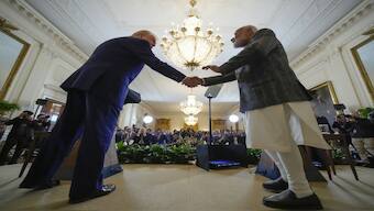 President Donald Trump and Prime Minister Narendra Modi shake hands during a news conference in the East Room of the White House. AP