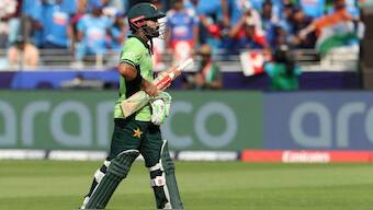 Mohammad Rizwan walks after losing his wicket against India. Image: Reuters