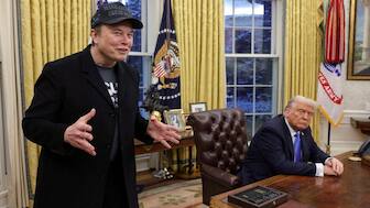 Elon Musk speaks next to US President Donald Trump in the Oval Office of the White House in Washington, DC, on., February 11. He heads the Doge, which is tasked with cutting costs of the US government. Reuters