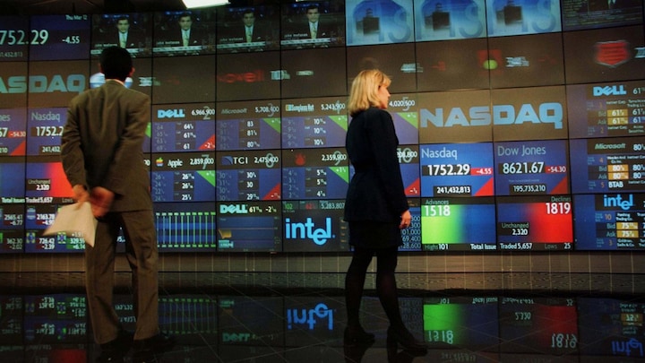 Global stocks remain mostly up despite new Trump tariffs, Nasdaq hits a fresh record