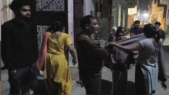 People rushed out of their houses as earthquake tremors hit Delhi-NCR early Monday morning. PTI