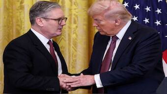 US President Donald Trump and British Prime Minister Keir Starmer shake hands at a press conference at the White House in Washington. Reuters