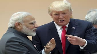 India's Prime Minister Narendra Modi, in conversation with US President Donald Trump. The US president has spared India right now from his tariff war. File image/AP