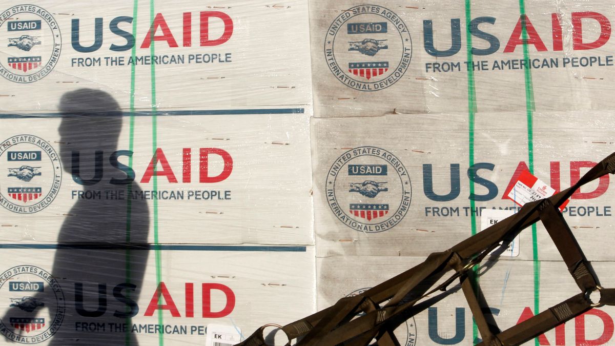 The shadow of a Philippine Army personnel is cast on boxes of relief items from USAID for the victims of super typhoon Haiyan, at Villamor Air Base in Manila in 2013. File image/Reuters The shadow of a Philippine Army personnel is cast on boxes of relief items from USAID for the victims of super typhoon Haiyan, at Villamor Air Base in Manila in 2013. File image/Reuters