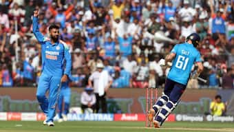 Varun Chakravarthy celebrates after taking the wicket of England's Phil Salt. Image: Reuters