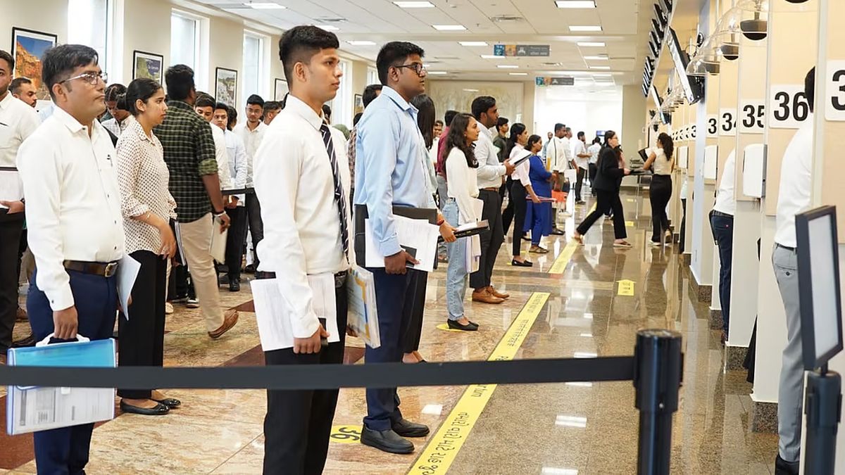 Indian applicants stand in queue at the US embassy in Mumbai for a visa interview. Image Courtesy: US Consulate Mumbai Indian applicants stand in queue at the US embassy in Mumbai for a visa interview. Image Courtesy: US Consulate Mumbai