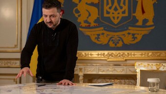 Ukraine's President Volodymyr Zelenskyy shows journalists a map of strategic resources and objects during an interview, amid Russia's attack on Ukraine, in Kyiv, on February 7. Donald Trump, who appears to be favouring Russia, slammed the Ukrainian leader, calling him a dictator. File photo/Reuters 