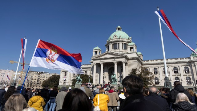 People protest in front of parliament building during the opening session of this year’s spring parliamentary convocation where it is expected to note a resignation of PM Milos Vucevic, in Belgrade, Serbia, March 4, 2025. Reuters