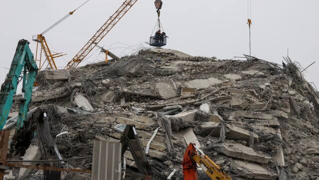 Rescue personnel work at the site of a building that collapsed, following a strong earthquake, in Bangkok, Thailand, March 30, 2025. Reuters