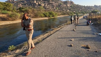 Police at the scene of the incident in Koppal district in the southern state of Karnataka. AP