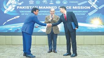 PM Shehbaz Sharif witnesses the exchange of agreements between officials from Suparco and CMSA, the Chinese space agency, on Friday. X