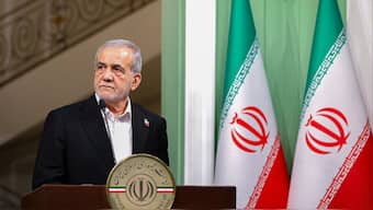 President Masoud Pezeshkian will defend Minister Abdolnaser Hemmati (not pictured), who will also speak in favour of his own record. AFP