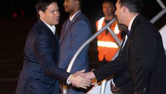 US Secretary of State Marco Rubio greets members of the crew as he boards a military airplane prior to departure from Homestead Air Reserve Base in Homestead, Florida, March 9, 2025, as he travels to Saudi Arabia and Canada. AFP
