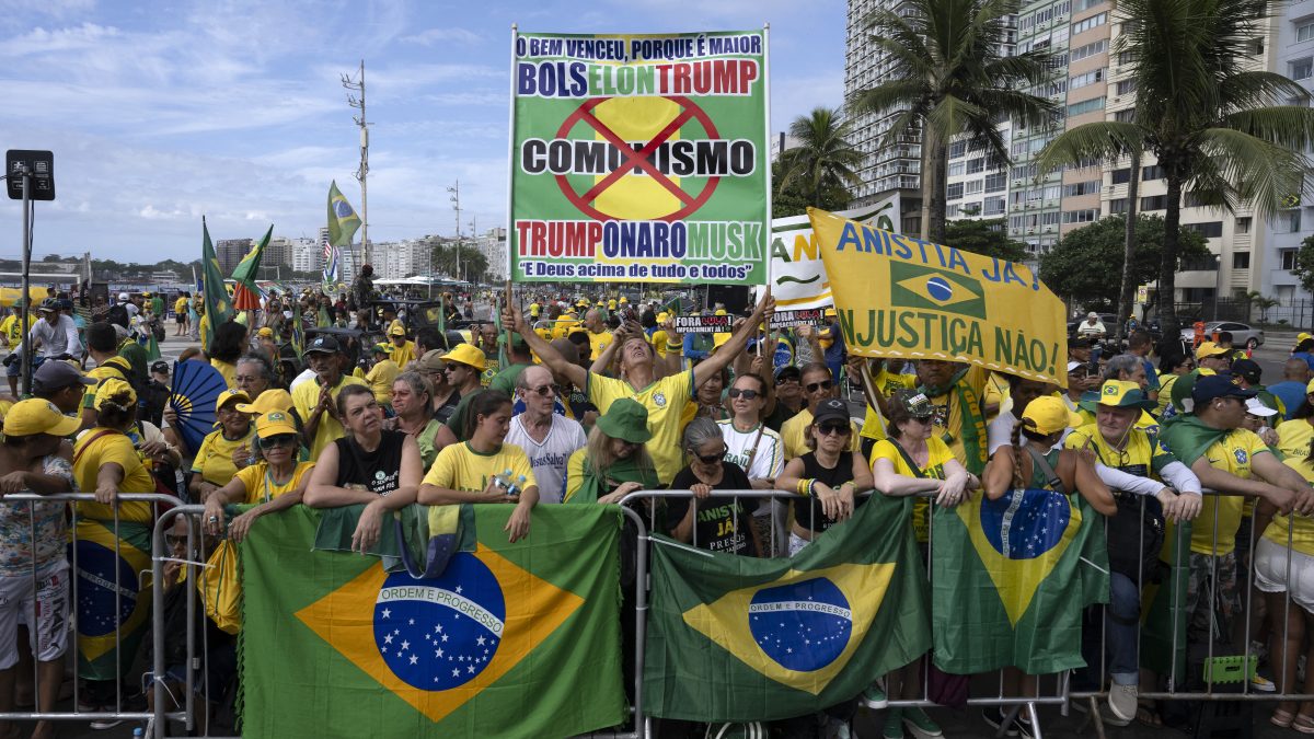 Supporters of Brazil's former president Jair Bolsonaro attend a rally at Copacabana beach in Rio de Janeiro, Brazil. AFP Supporters of Brazil's former president Jair Bolsonaro attend a rally at Copacabana beach in Rio de Janeiro, Brazil. AFP