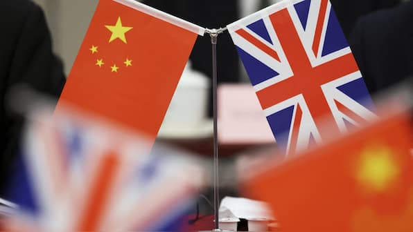UK energy minister pushes Chinese officials on emissions, human rights in Beijing