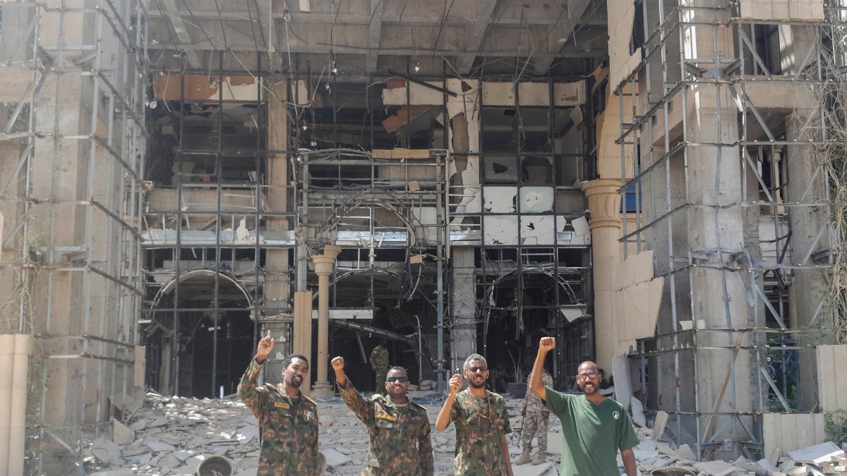 Soldiers of the Sudanese army or affiliated forces pose for a picture while pumping their fists at the damaged presidential palace after recapturing the complex from RSF paramilitaries in Khartoum. AFP Soldiers of the Sudanese army or affiliated forces pose for a picture while pumping their fists at the damaged presidential palace after recapturing the complex from RSF paramilitaries in Khartoum. AFP