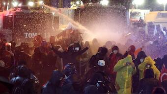 Protesters clash with Turkish anti riot police using tear gas and water cannons during a demonstration in support of Istanbul's arrested mayor, in Ankara. AFP