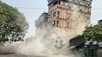 This photo shows a building collapsing in Mandalay on March 28, 2025, during an earthquake. (Photo by AFP)