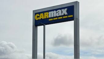 A CarMax sign stands at a location in California. File image/ AP
