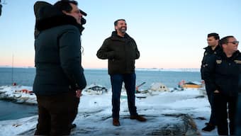 Donald Trump Jr., centre, smiles after arriving in Nuuk, Greenland, Tuesday, January 7, 2025. AP